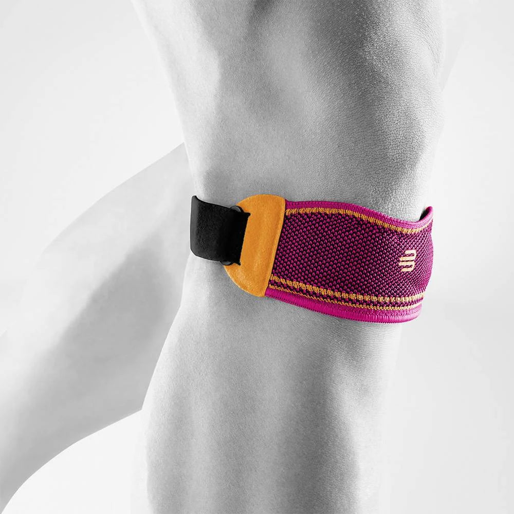 Bauerfeind Sports Knee Strap knäband i rosa med orange fäste