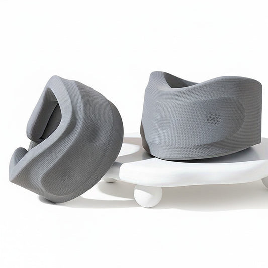 Ergonomiskt nackstöd i mjukt grått material