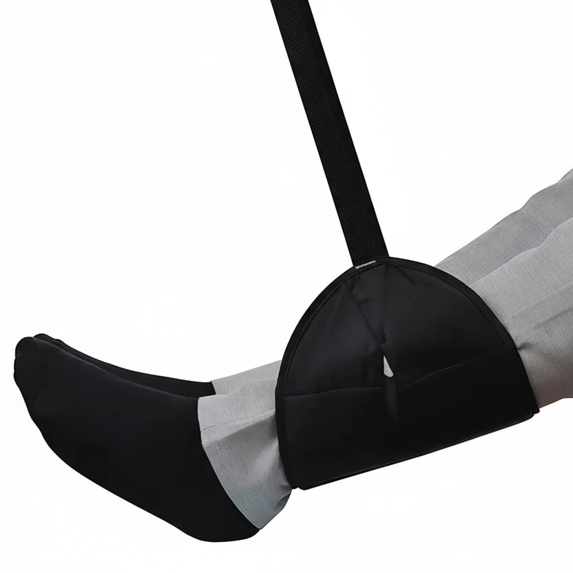 Fotstöd i användning under flygresa i sittande position