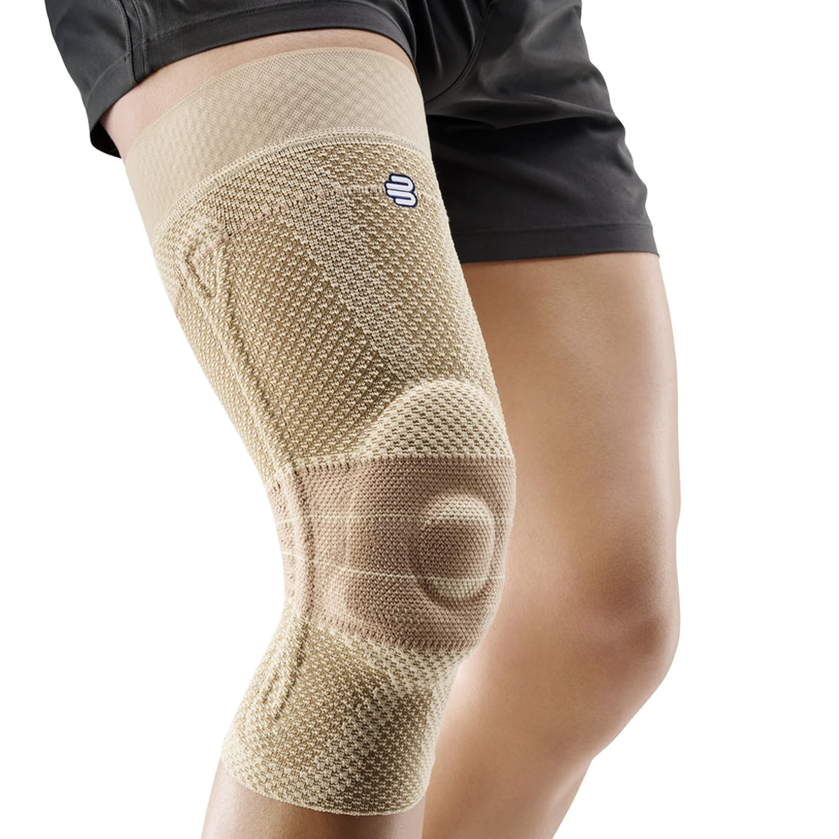 GenuTrain i beige med silikonband upptill, vit bakgrund
