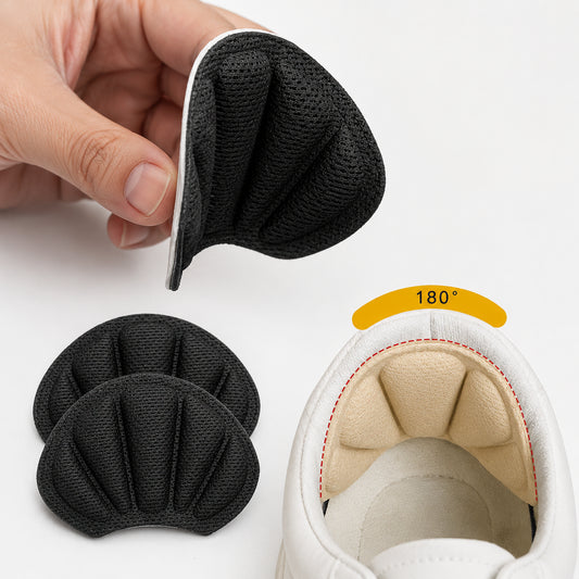 Hälskydd för skor med mjuk stötdämpande design som hjälper till att minska friktion och ge ökad komfort i hälen. Visar flexibel 180° böjbar konstruktion och självhäftande hälkuddar för bättre passform i skor.