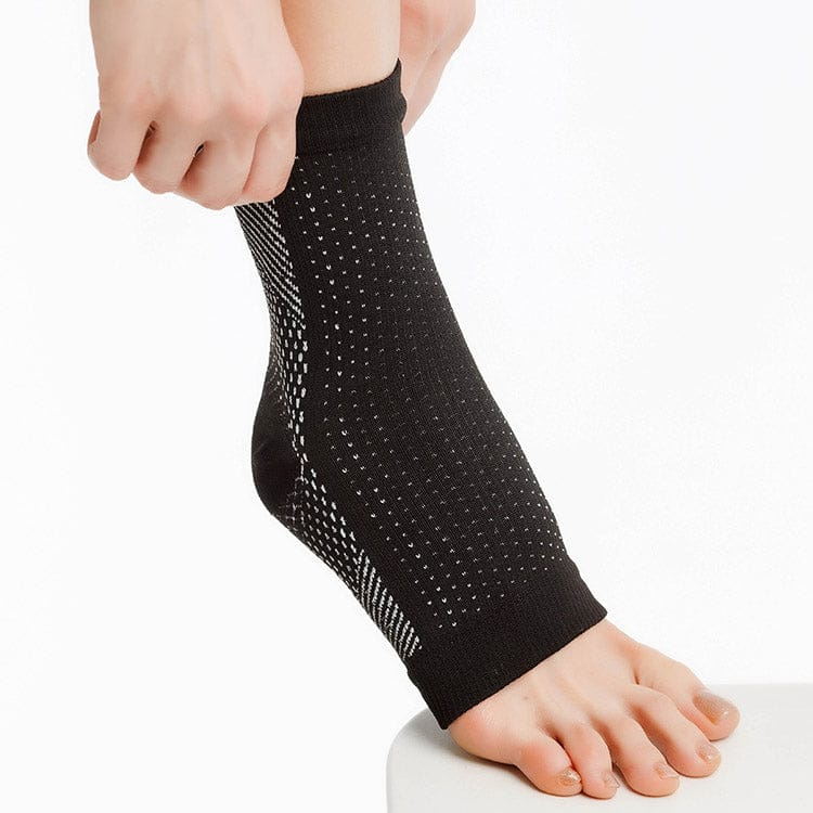 Hälsporrestrumpa som bärs runt fot och häl
