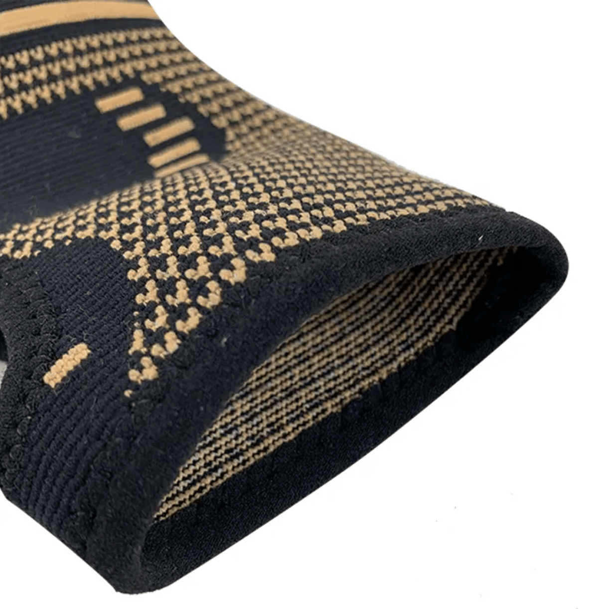 Detaljbild som visar det mjuka och elastiska materialet i handledsstödet