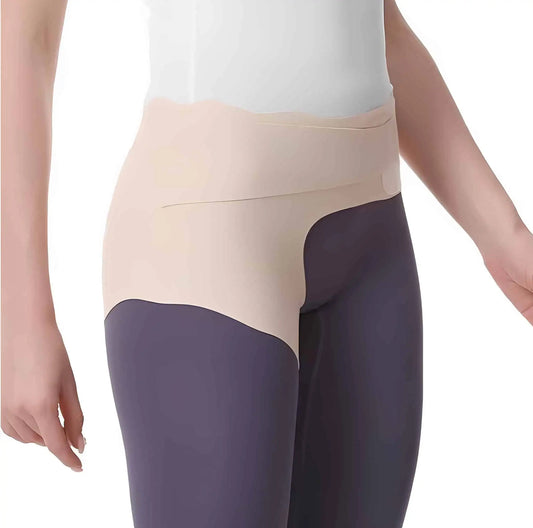 Höftstöd med kompression som bärs runt höft och bäcken