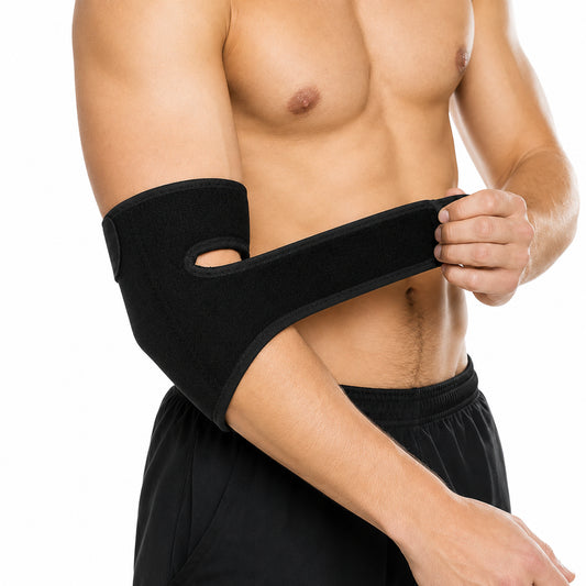 Justerbart armbågsstöd med kardborreband som ger kompression och stöd runt armbågen.