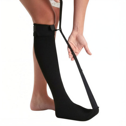 Person använder nattsocka mot hälsporre på fot och vad