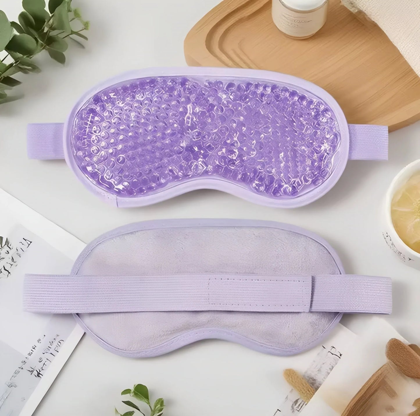 Ögonmask med flexibla gelkulor, mjuk baksida och justerbart band för kylande eller värmande komfort.