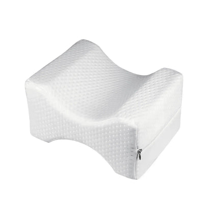 Ergonomiskt utformad kudde som ger stöd för knän och lår