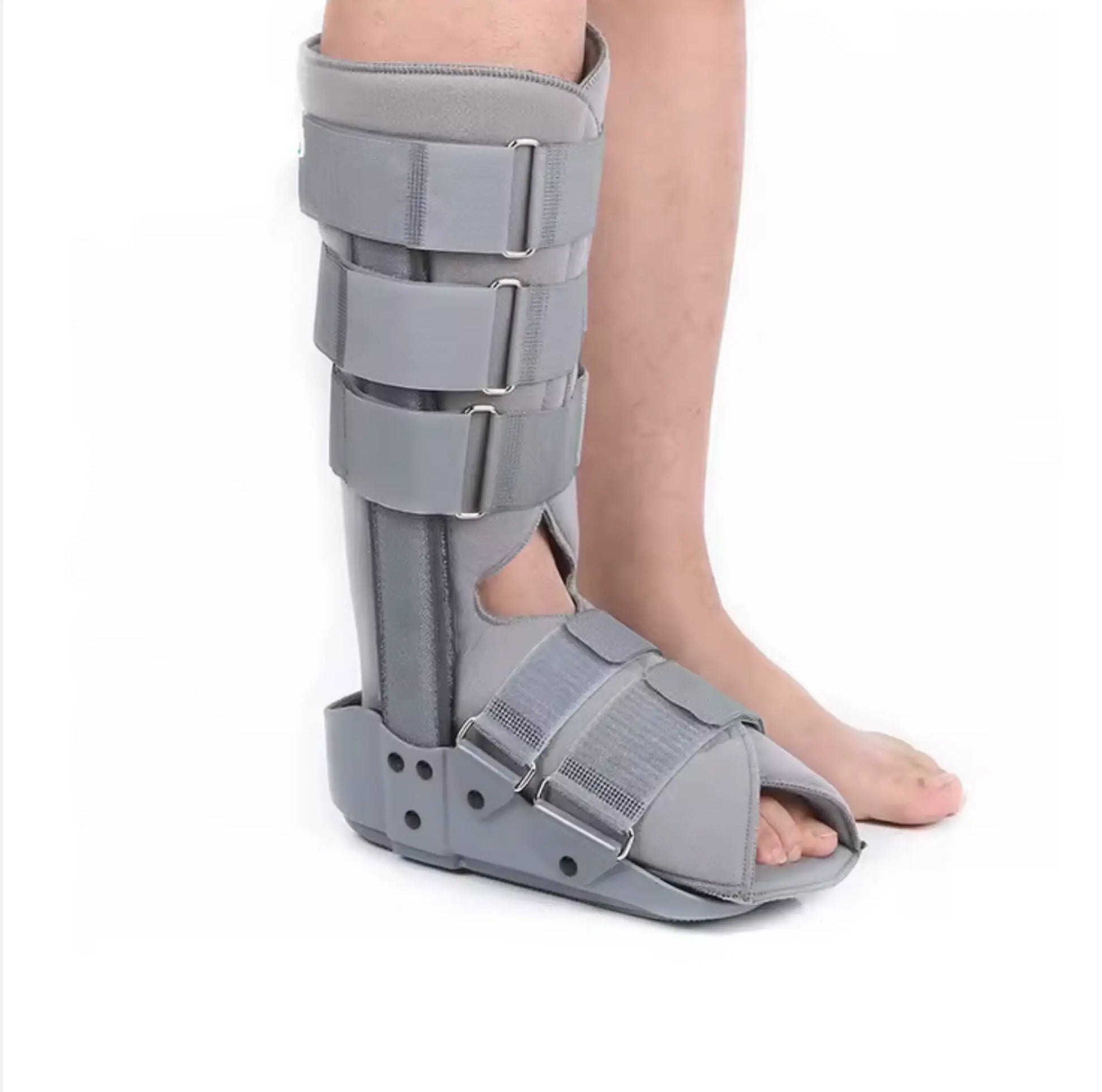 Ortopedisk rehabiliteringssko med justerbart stöd på fot