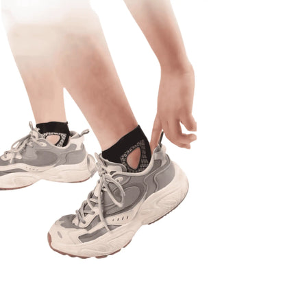 Fotledsstöd som används diskret i träningssko