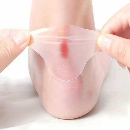 Självhäftande hälskydd applicerat över hälen