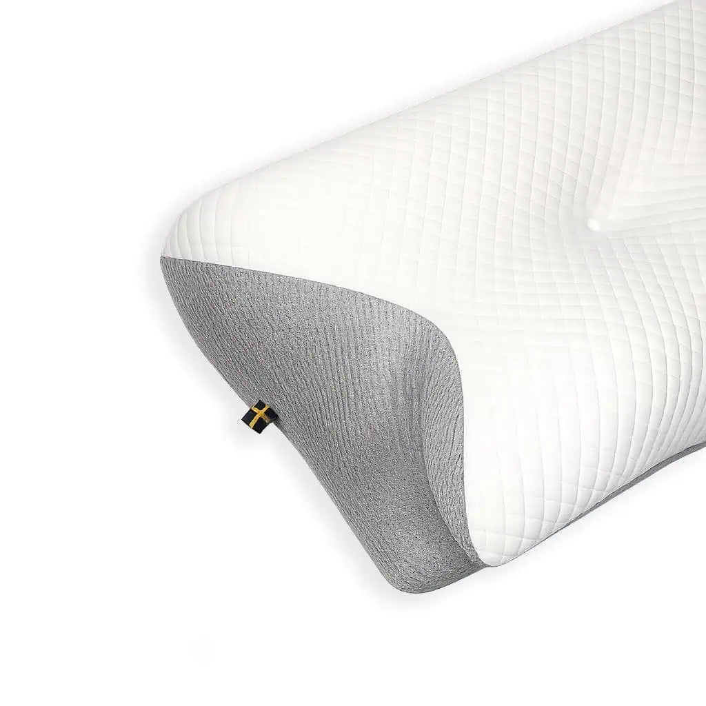 Närbild på ergonomisk sovkudde med formsytt nackstöd och ventilerande överdrag