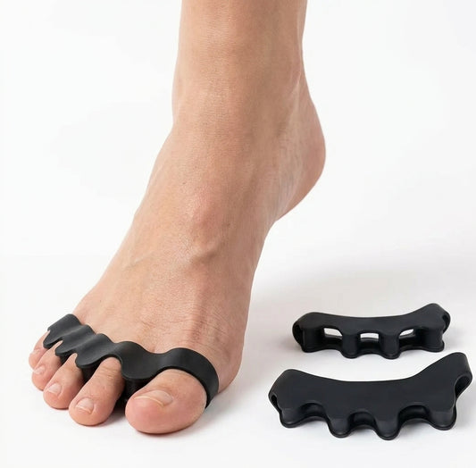 Tåseparerare mot hallux valgus som håller tårna åtskilda