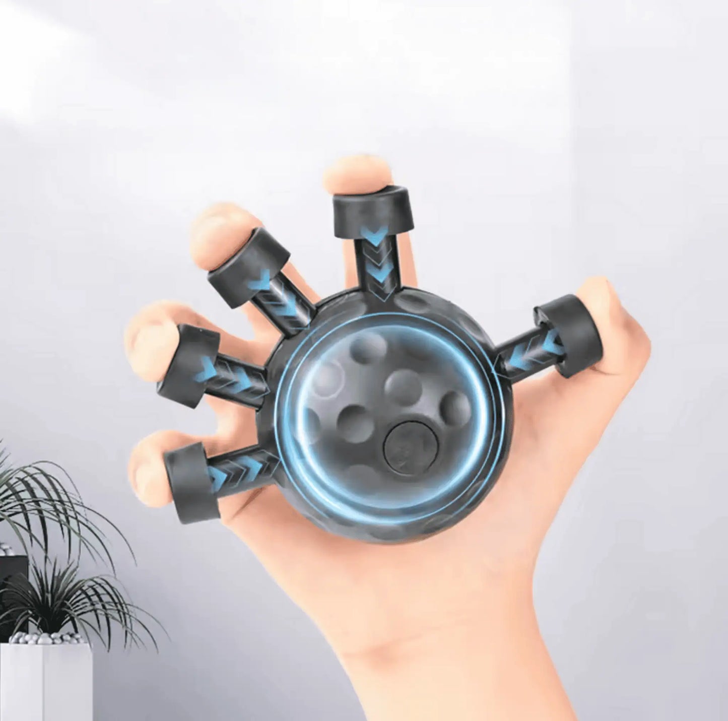 Hand som klämmer träningsbollen för fingerträning