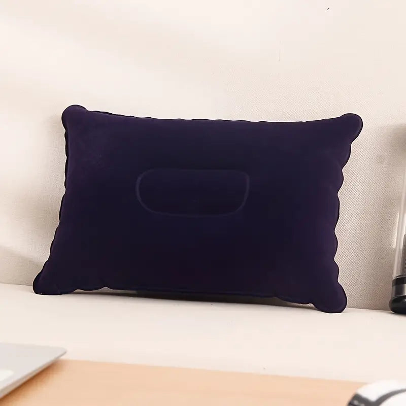 Uppblåsbar kudde formad för nacke och rygg